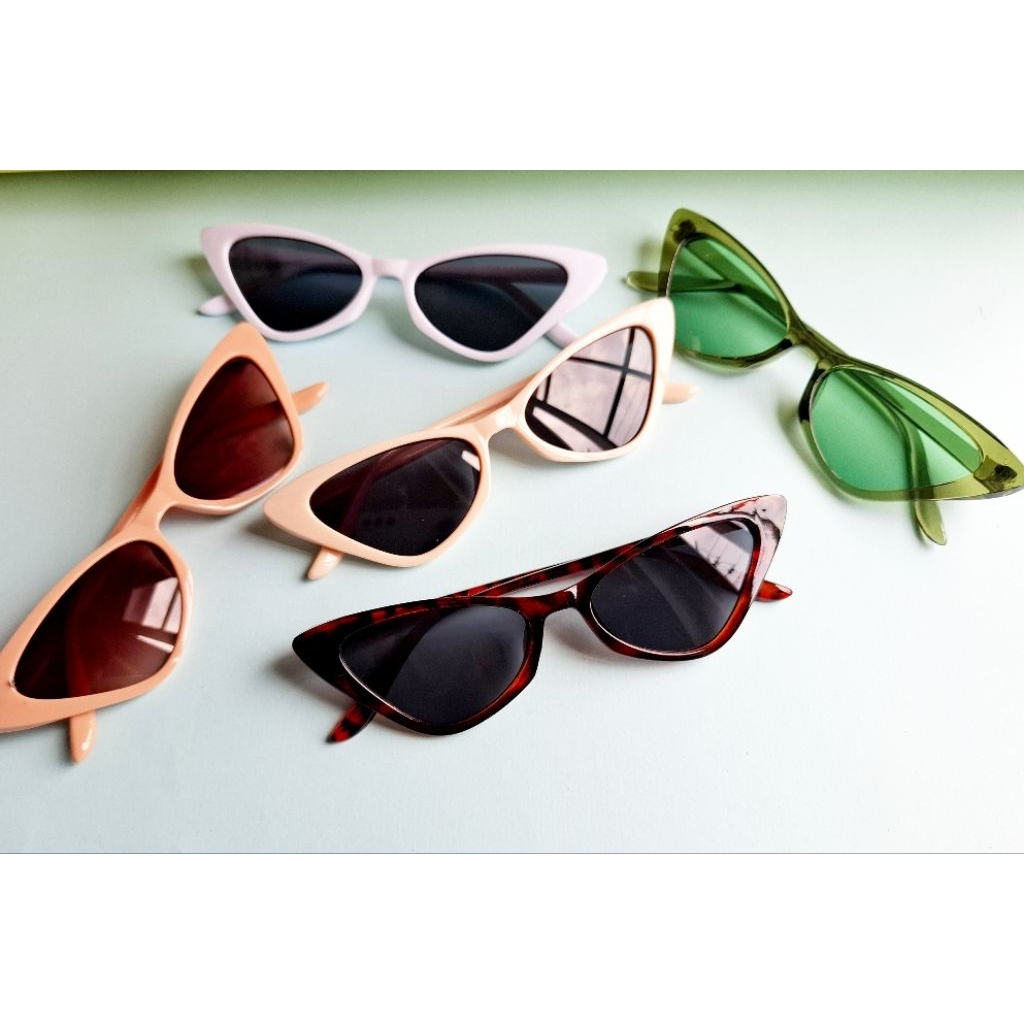 kacamata cat eye wanita,kacamata hitam pria wanita,kacamata pantai kacamata hitam kekinian