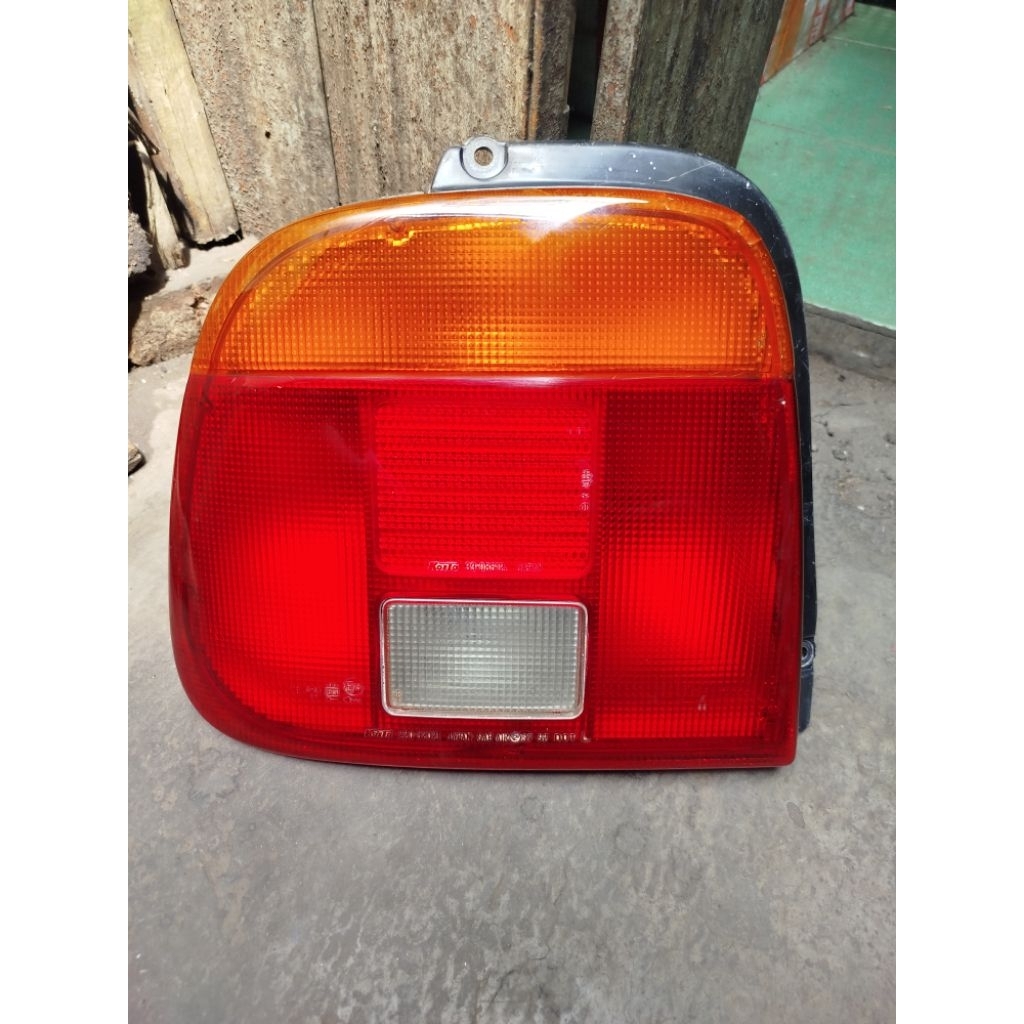 LAMPU BELAKANG SUZUKI BALENO THN 1997-2000 ORIGINAL, STOPLAMP BALENO THN 1997-2000, LAMPU REM BALENO