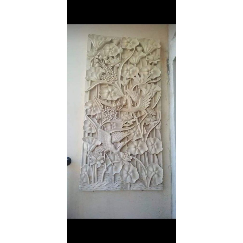 hiasan dinding relief batu paras