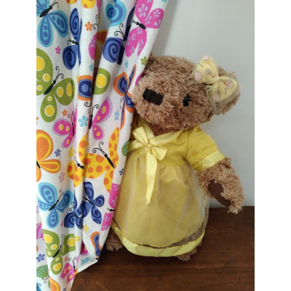 boneka teddy putar dress kuning