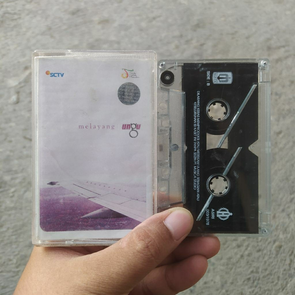 Kaset Pita Ungu - Melayang