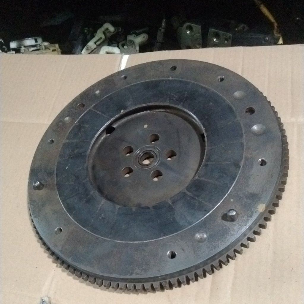 FLY WHEEL FLYWHEEL RODA GILA MITSUBISHI L300 BENSIN ORIGINAL COPOTAN GARANSI