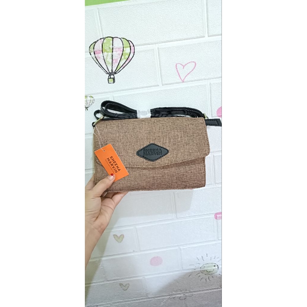 NEW TAS SHEENA MARVIN