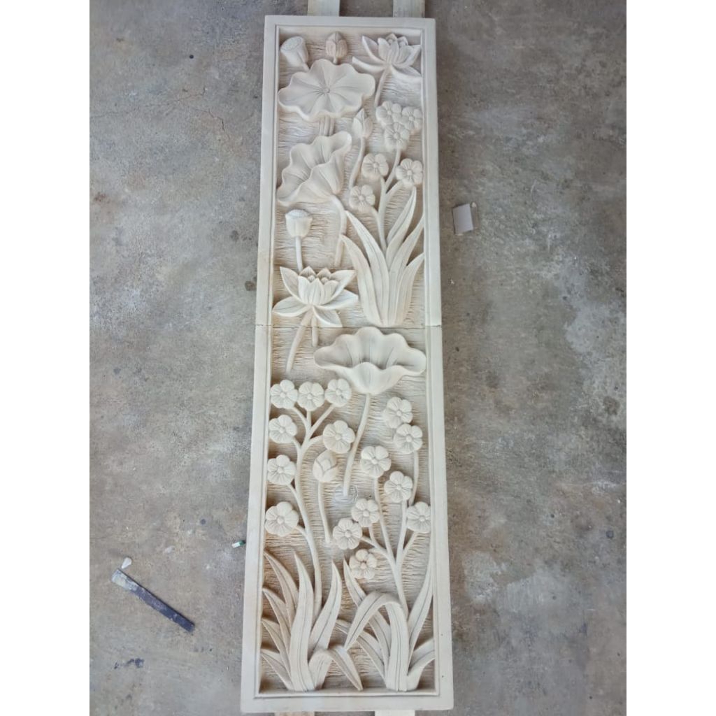 relief batu alam design bunga