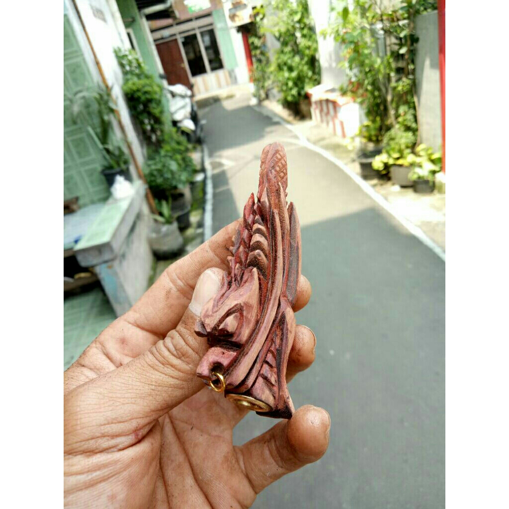 Once pipa kayu Stigi Kalimasada ukir naga