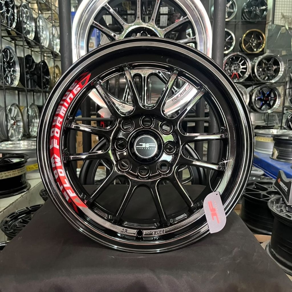 JF LUXURY BUZZ R15 LEBAR 6,5 PCD 4X100-4X114,3 ET 42 WARNA GLOSSY BLACK