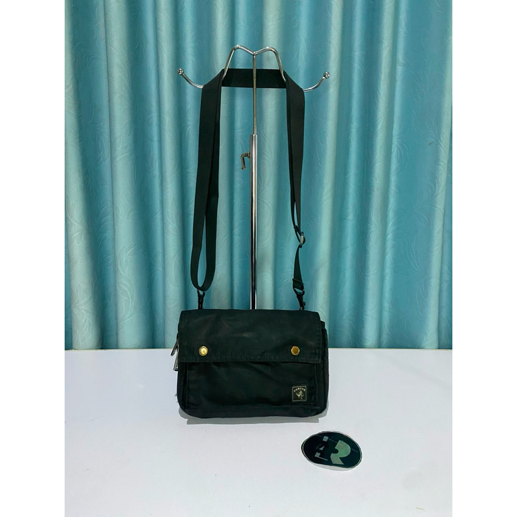 tas sling Porter internasional