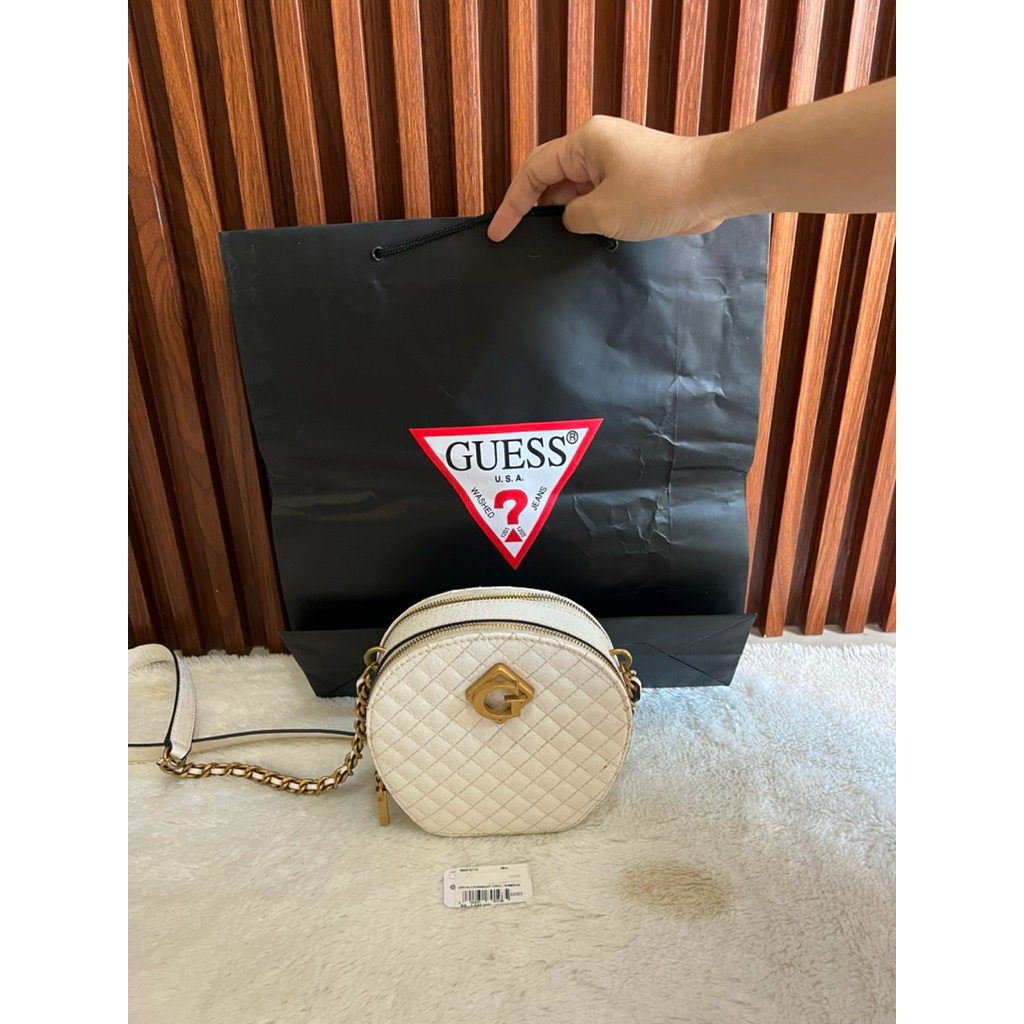 tas bulat guess original 100000% cantik simple oke banget kek GC