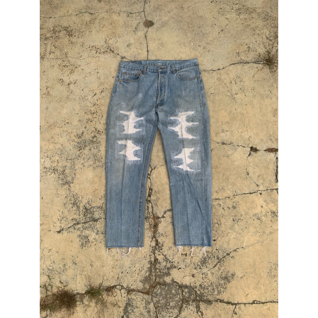 Vintage 90's Levis 501 faded and distressed Jeans