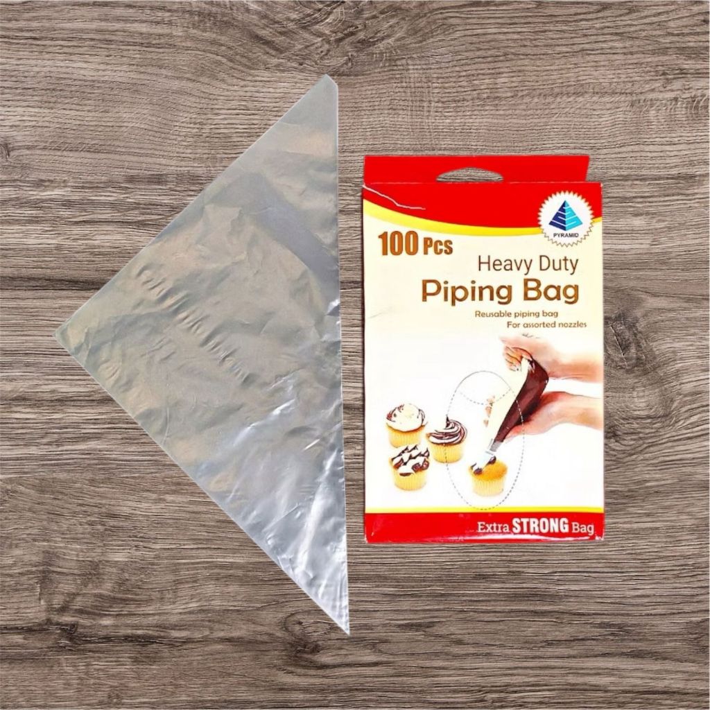 

PLASTIK SEGITIGA / PIPING BAG / PLASTIK GLASUR HARGA PERKOTAK ISI 100 LEMBAR - MURAH!!!