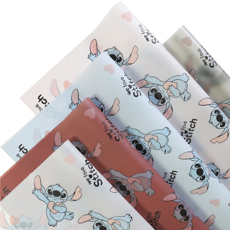 

Kertas Buket Bunga Kado Motif Karakter Kartun Anak Stitch Lucu Cellophane Paper Florist Waterproof KB86