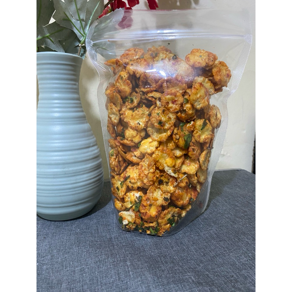 

Cemilan Emping Ceplis melinjo Pedas Manis 500gram Rasa daun jeruk