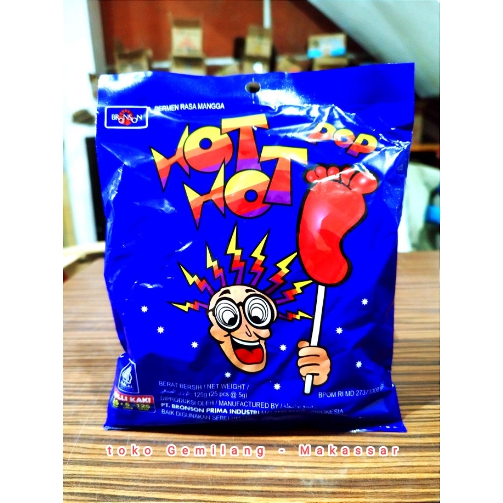 

Hot Hot Pop 125 gr ( 25 pcs @ 5 gr ), permen lollipop bentuk kaki rasa mangga