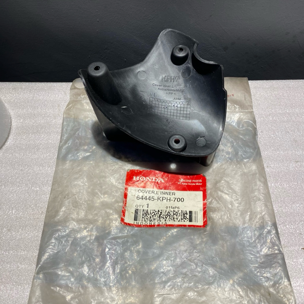 64445 KPH 700 COVER TUTUP SEIN DEPAN KIRI SUPRA X 125 LAMA 2005-2006 ORIGINAL AHM