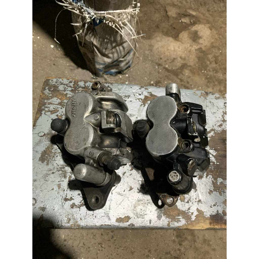 kaliper depan megapro/tiger original