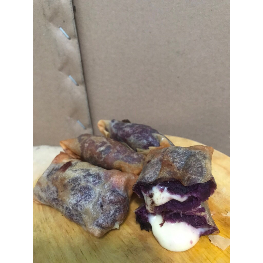 

Lumpia ubi ungu isi keju per pack isi 4