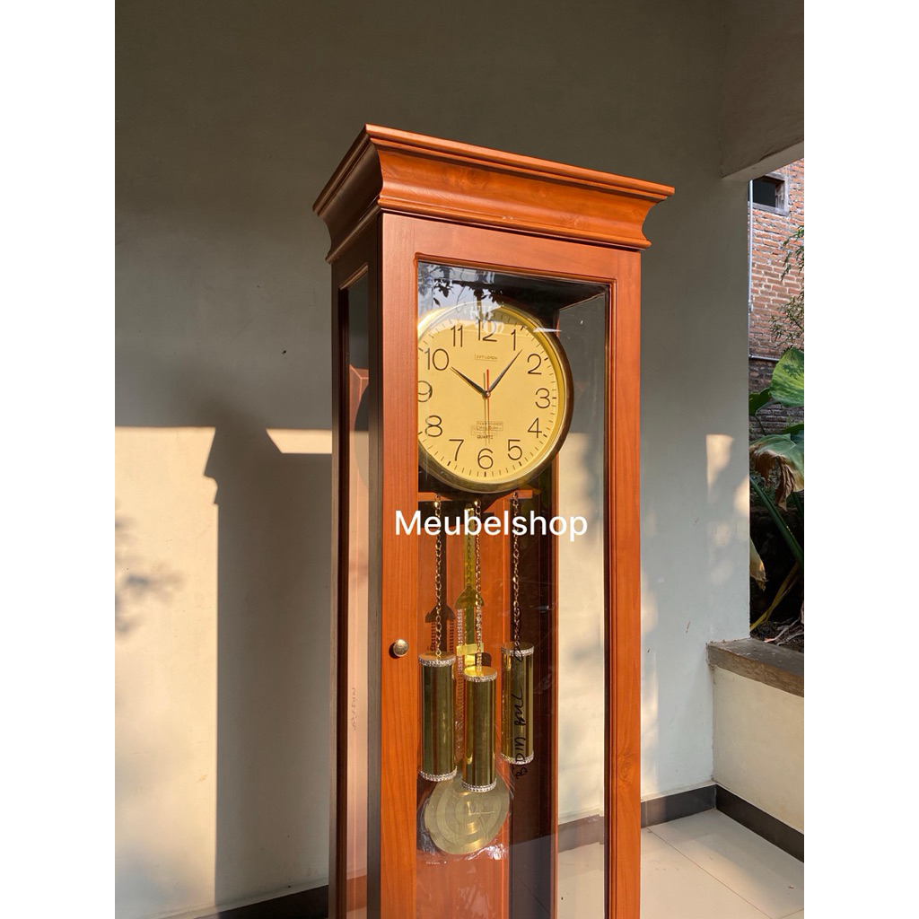 lemari jam minimalis kayu jati