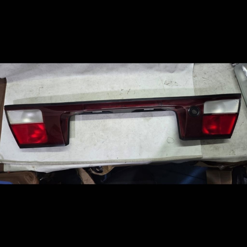 Lampu reflektor bagasi belakang mazda lantis 323 familia original new old stock