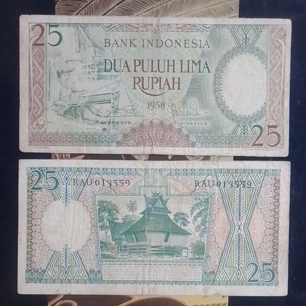 UANG KUNO 25 RUPIAH PEKERJA TAHUN 1958 BEKAS PAKAI