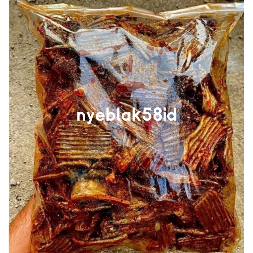 

KERUPUK JENGKOL PEDAS DAUN JERUK KEMASAN 250GRAM BUMBU MELIMPAH