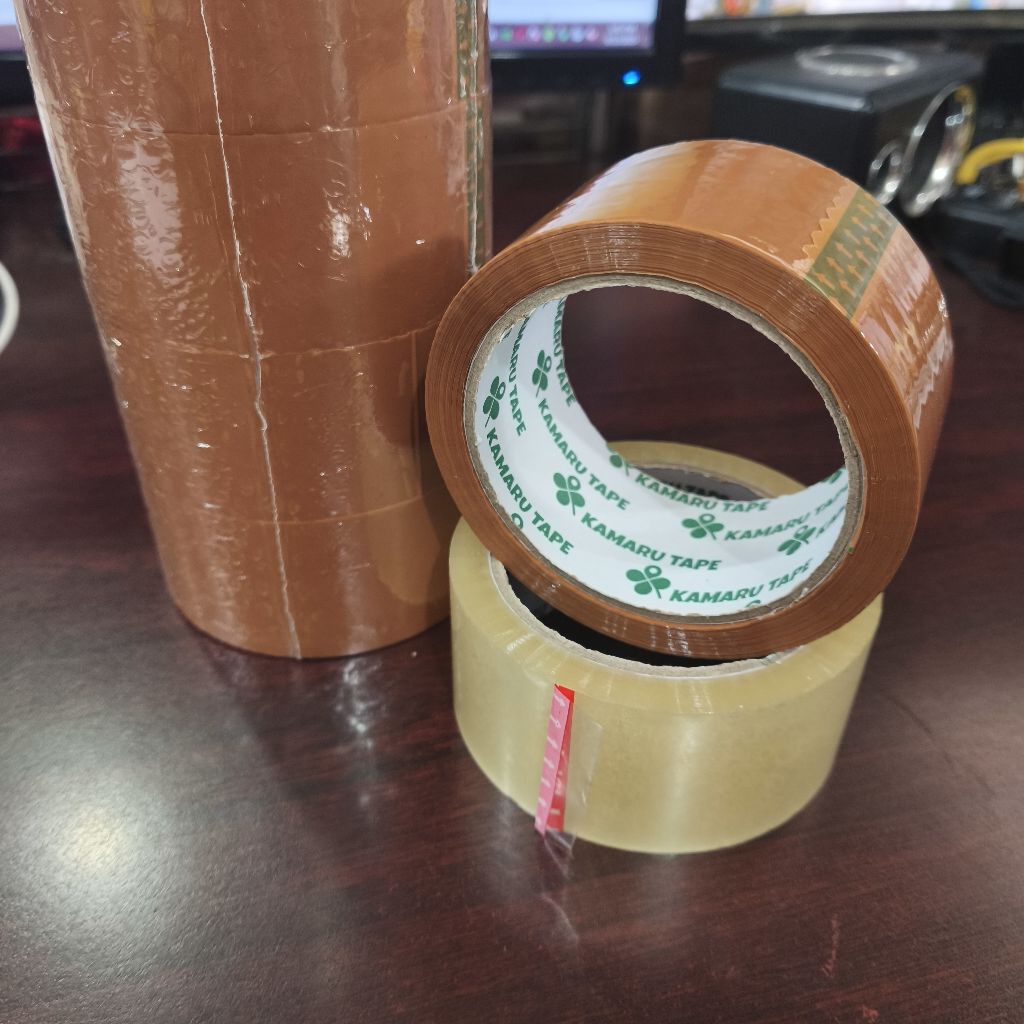 

Lakban Besar / Perekat / Isolasi OPP Kamaru 72yard (Bening / Coklat)