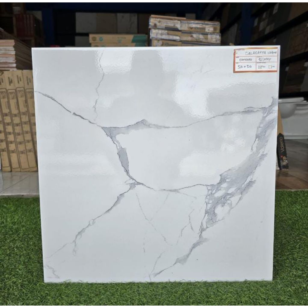 Keramik lantai concord 50x50 Calacata white