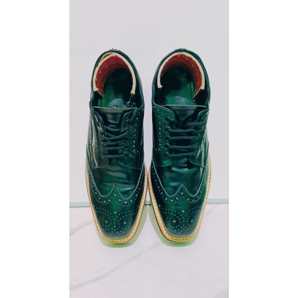 pantopel kulit wingtip