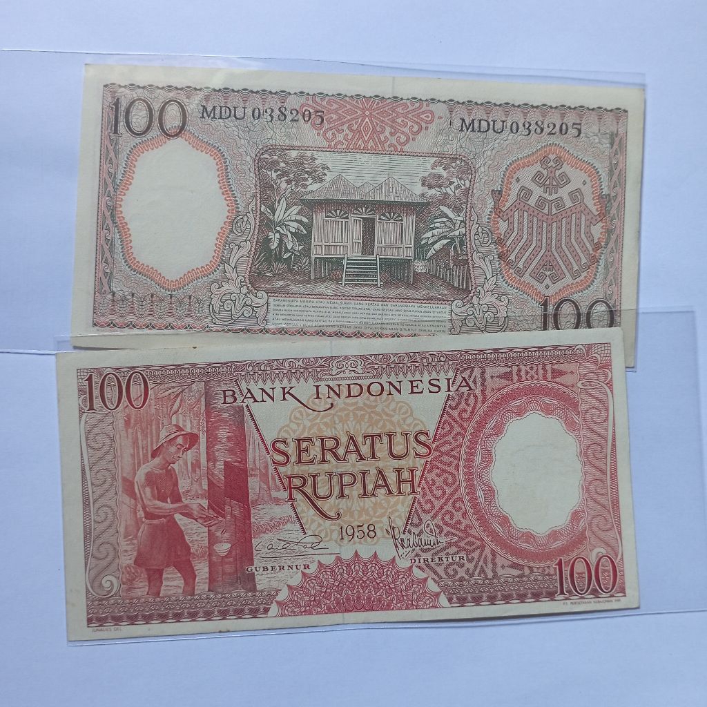 100 rupiah uang kertas pekerja tahun 1958 baru asli