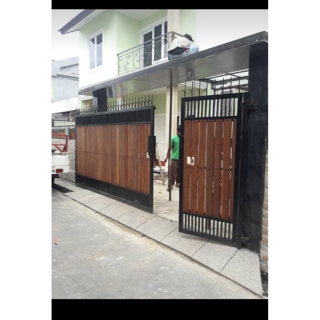pintu pagar besi dengan papan grc pengaman rumah anti maling