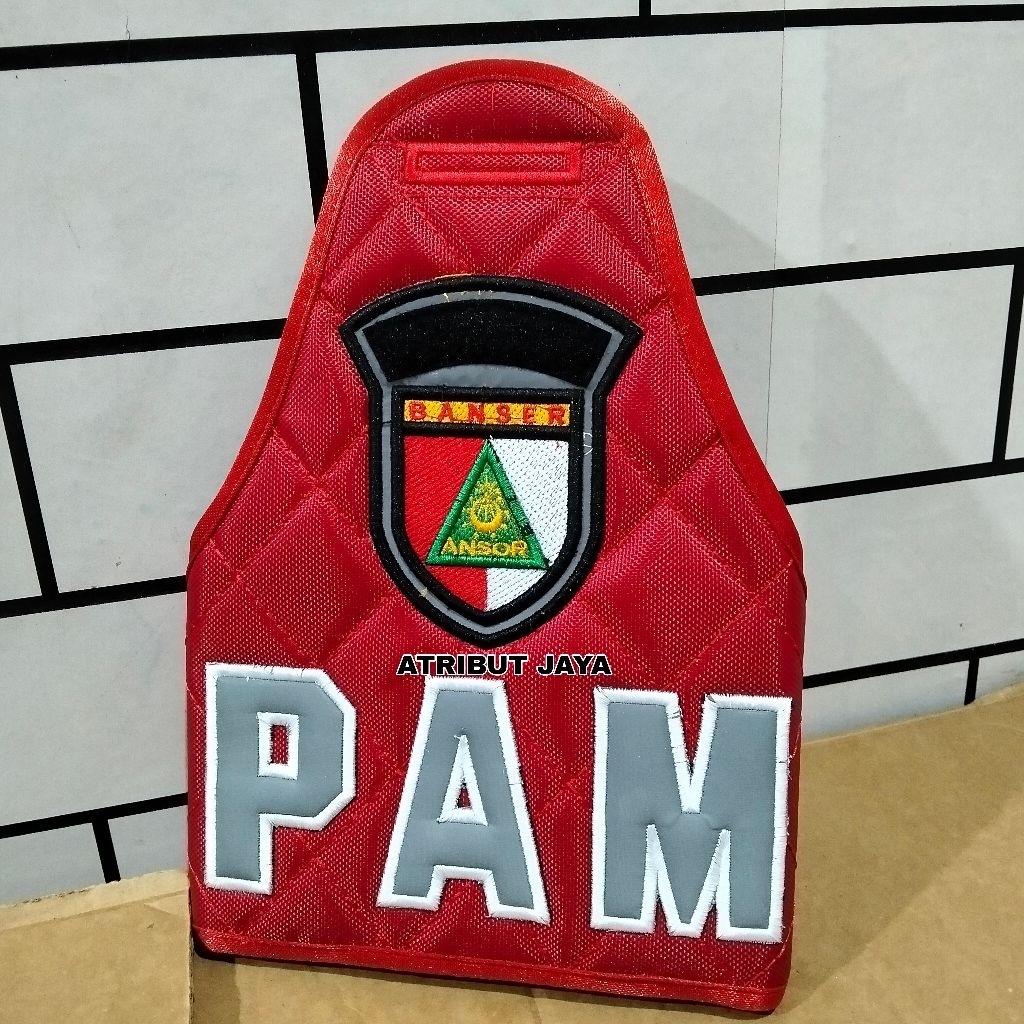 ban lengan PAM Banser merah timbul