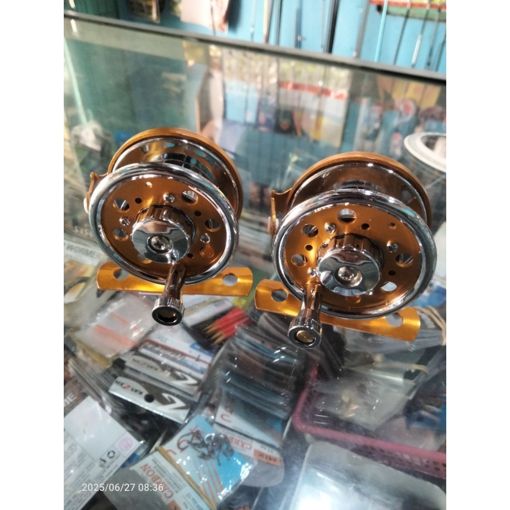 TOKOS REEL EMAS BAHAN METAL FOURSTARS