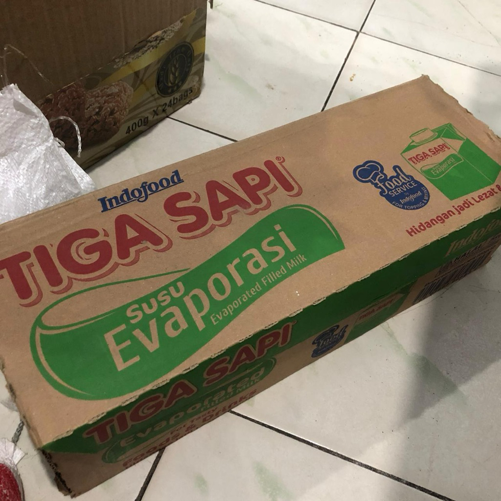 susu tiga sapi evaporasi 1 karton (isi 12)