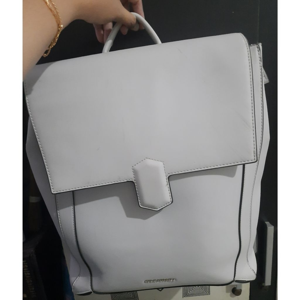 Preloved - Tas ransel bahan kokoh muat laptop untuk wanita merk Hush Puppies