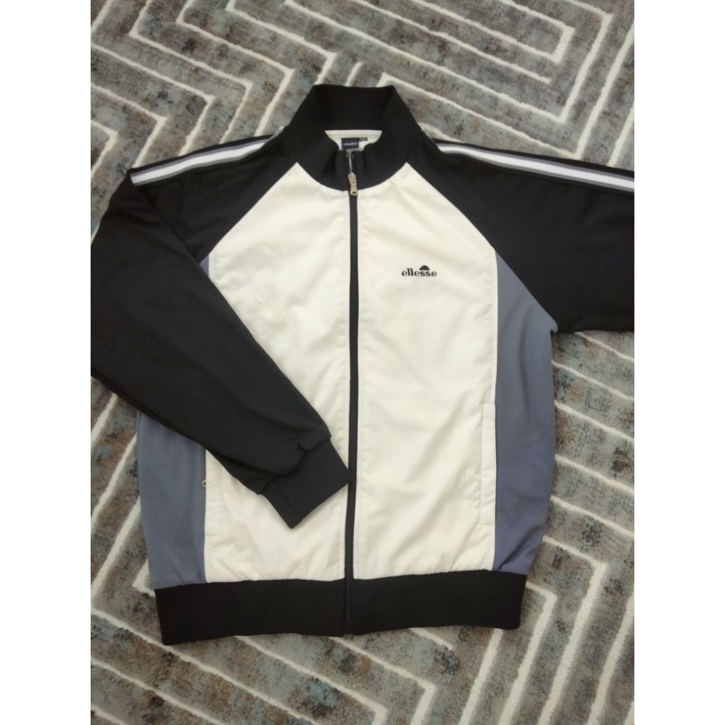 jaket trakctop ELLESSE,,kombinasi 3 bahan,mewah,mulus ,seperti baru,joss