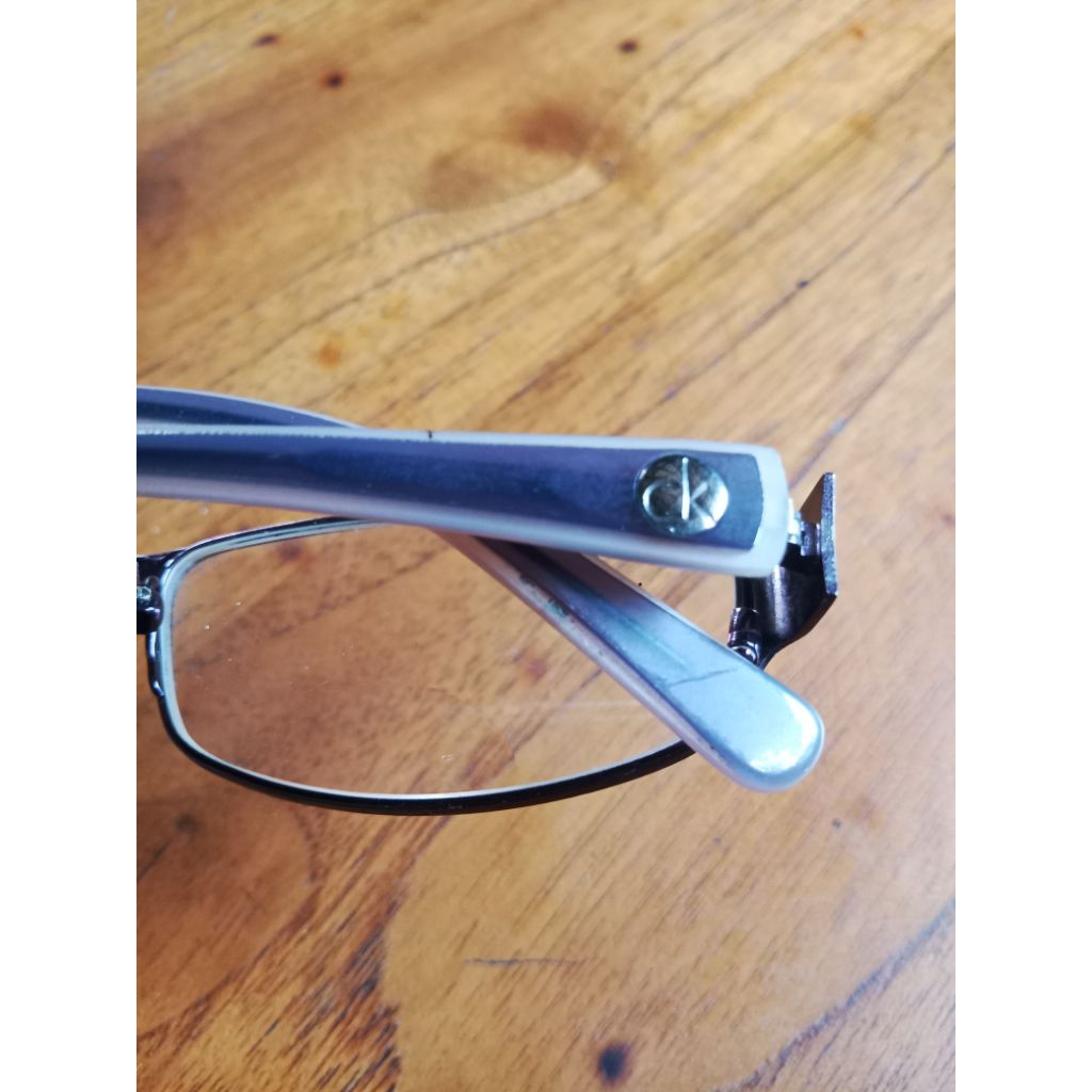 Calvin Klein frame dan lensa kaca mata baca original.