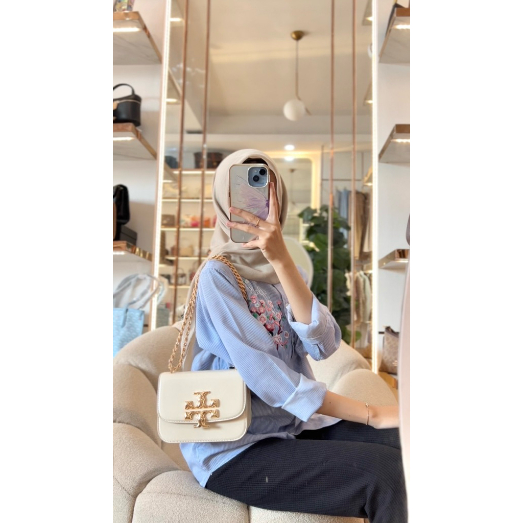 Tas wanita tb