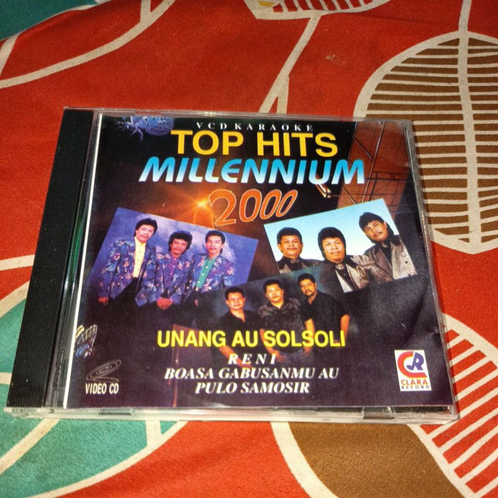 VCD TOP HITS MILLENIUM 2000 TRIO AMBISI TRIO MADUMA CHARLES SIMBOLON