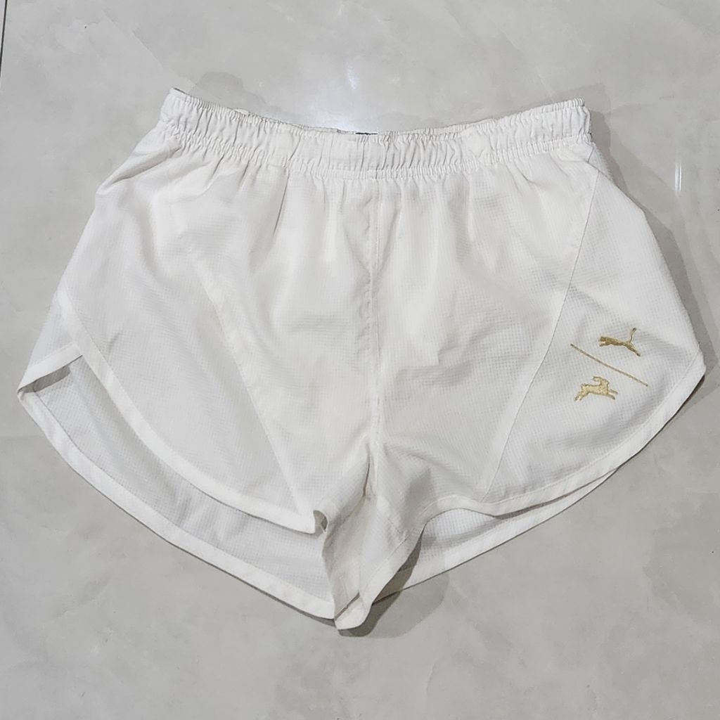 Preloved Tracksmith Puma gold edition Men's running shorts size S