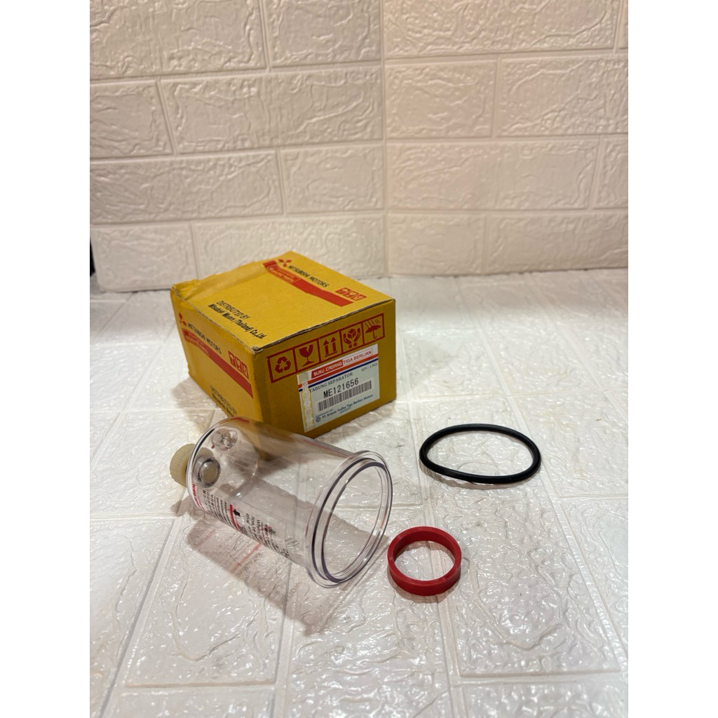 tabung separator solar atau kaca filter solar bawah mitsubishi ps125t / canter ME121656