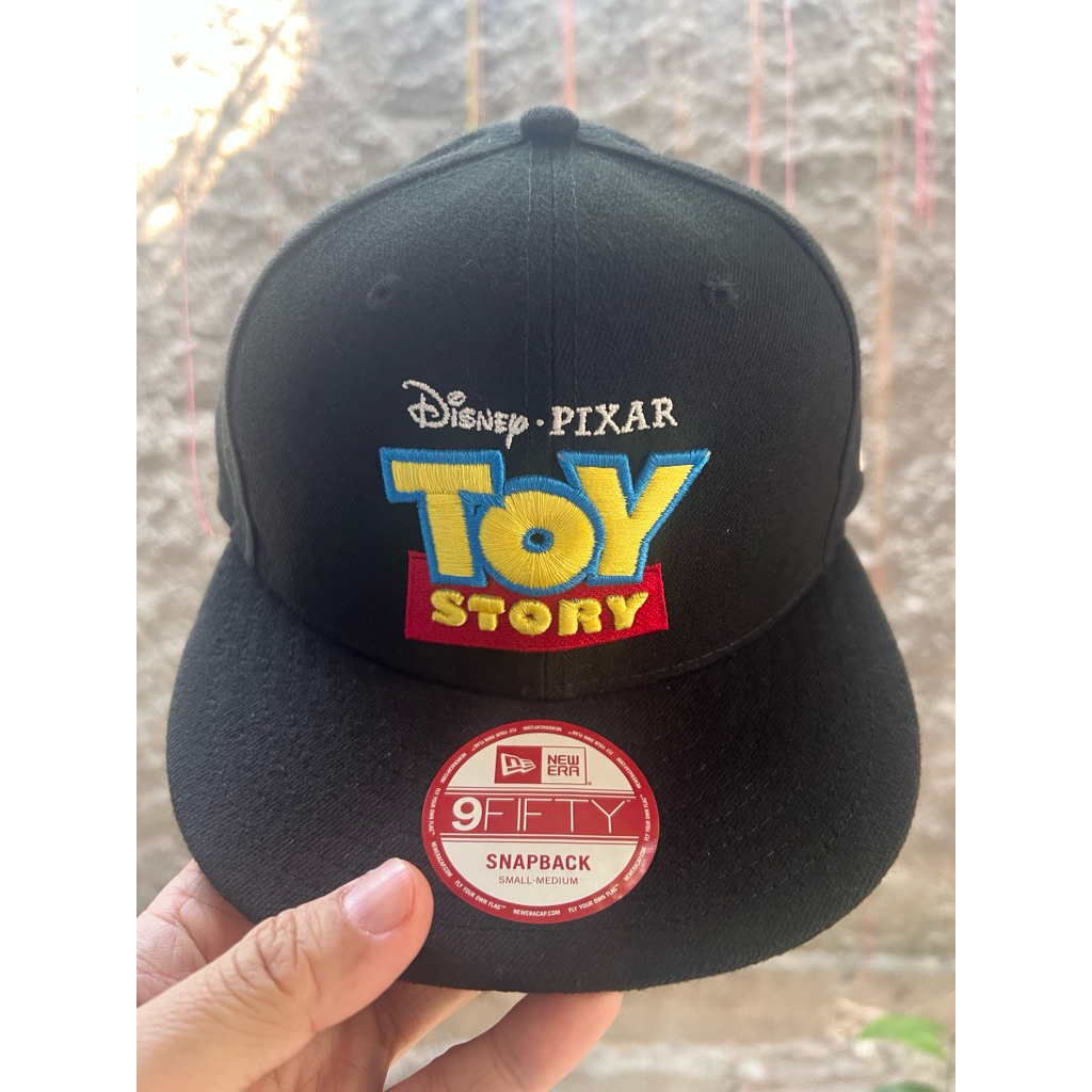 ⁠Topi Snapback NE 9FIFTY Toy Story Size Small Medium Hitam Preloved⁠