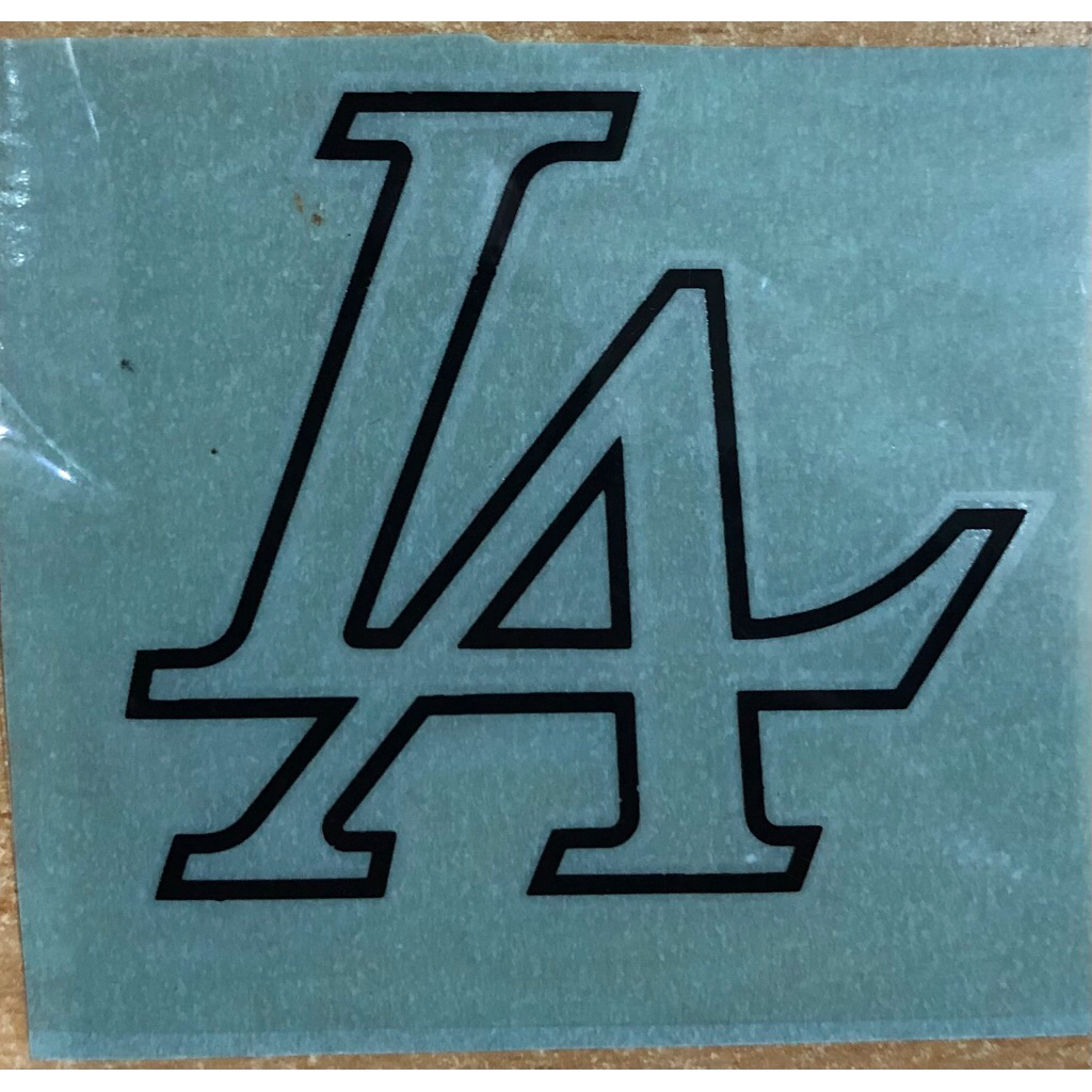 

Stiker loggo LA Uk 5,4 CM x 4,8 CM Warna Hitam