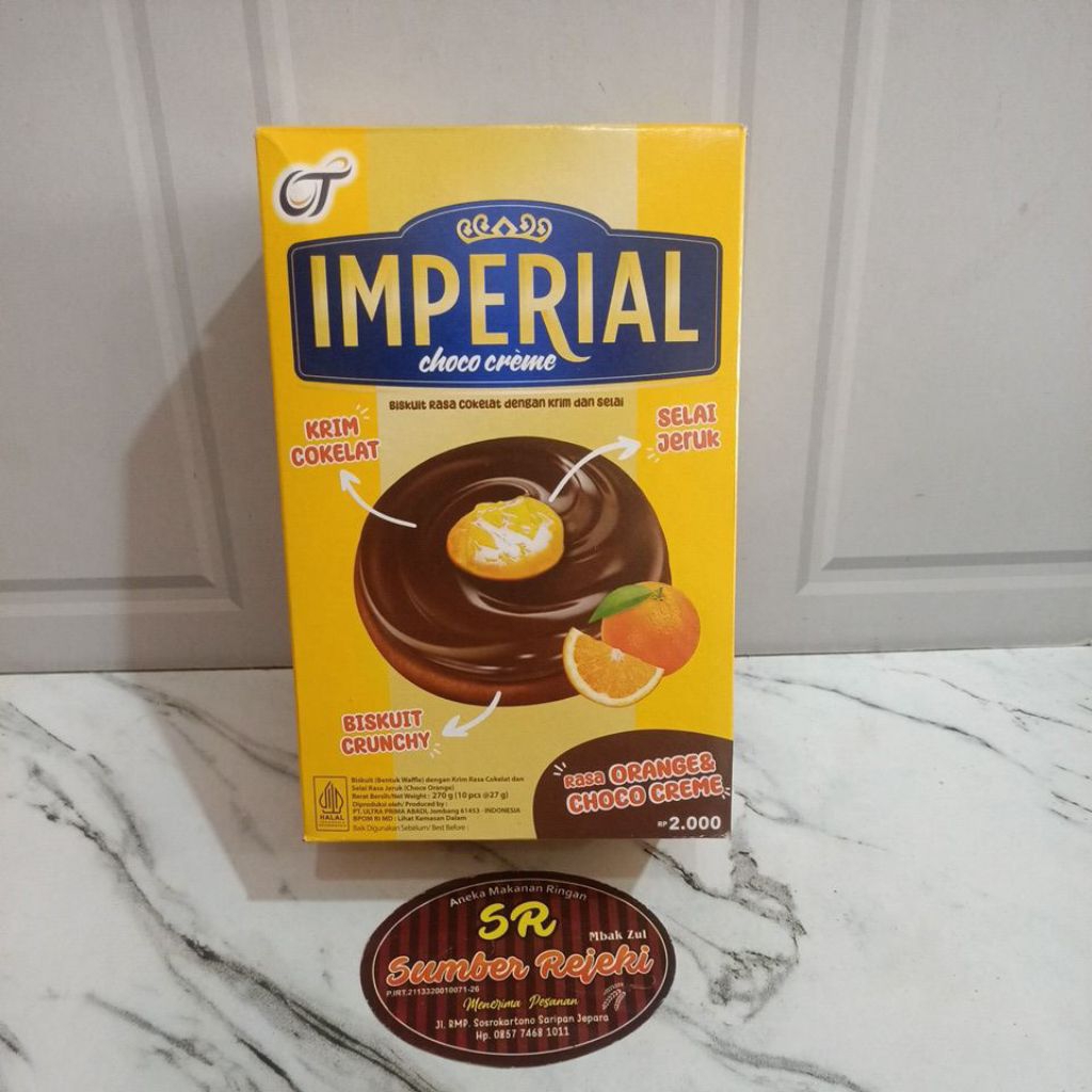 

IMPERIAL CHOCO CREAM BISKUIT DENGAN KRIM COKELAT DAN SELAI JERUK ISI 10 BUNGKUS