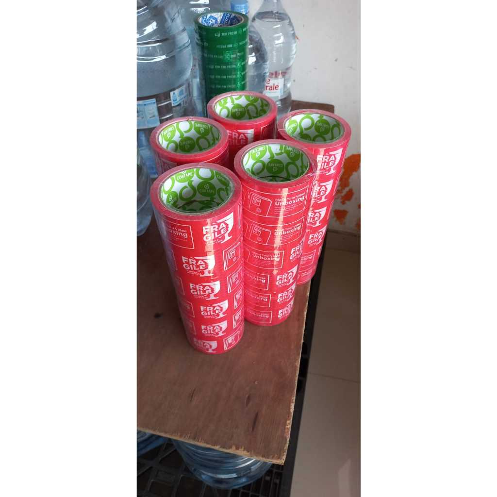 

Lakban fragile plus unboxing warna merah ukuran 45 mm x 72 yard tebal 50 micron per pcs