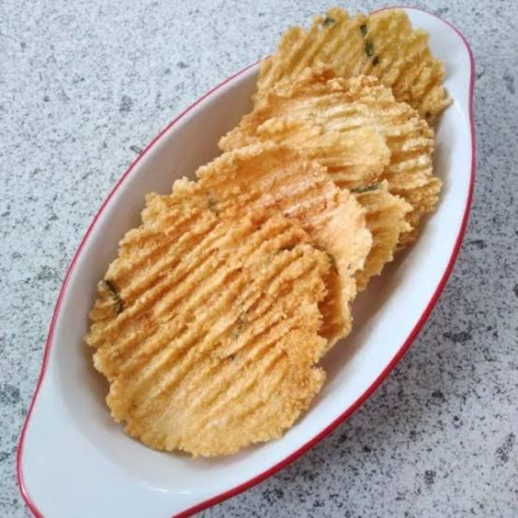 

Cemilan Enye Enye Singkong Isi 20/pack. Enak, Renyah dan gurih.