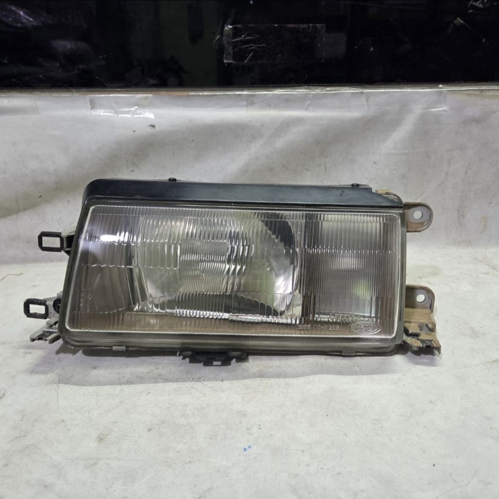 Headlamp kiri ford laser 90