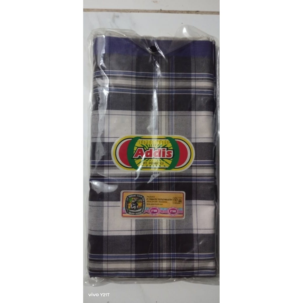 sarung merk addis gajah duduk