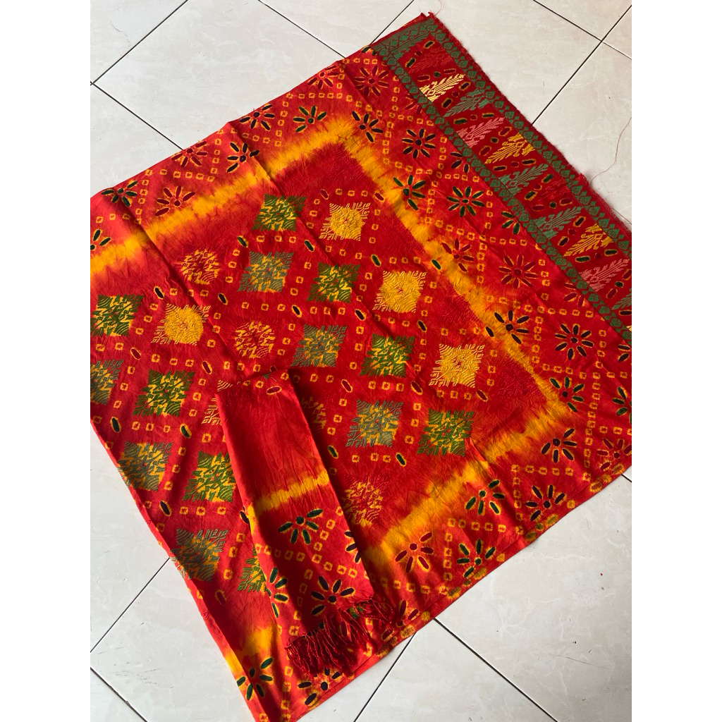 Sutra Jumputan Cakra Tumpal Songket