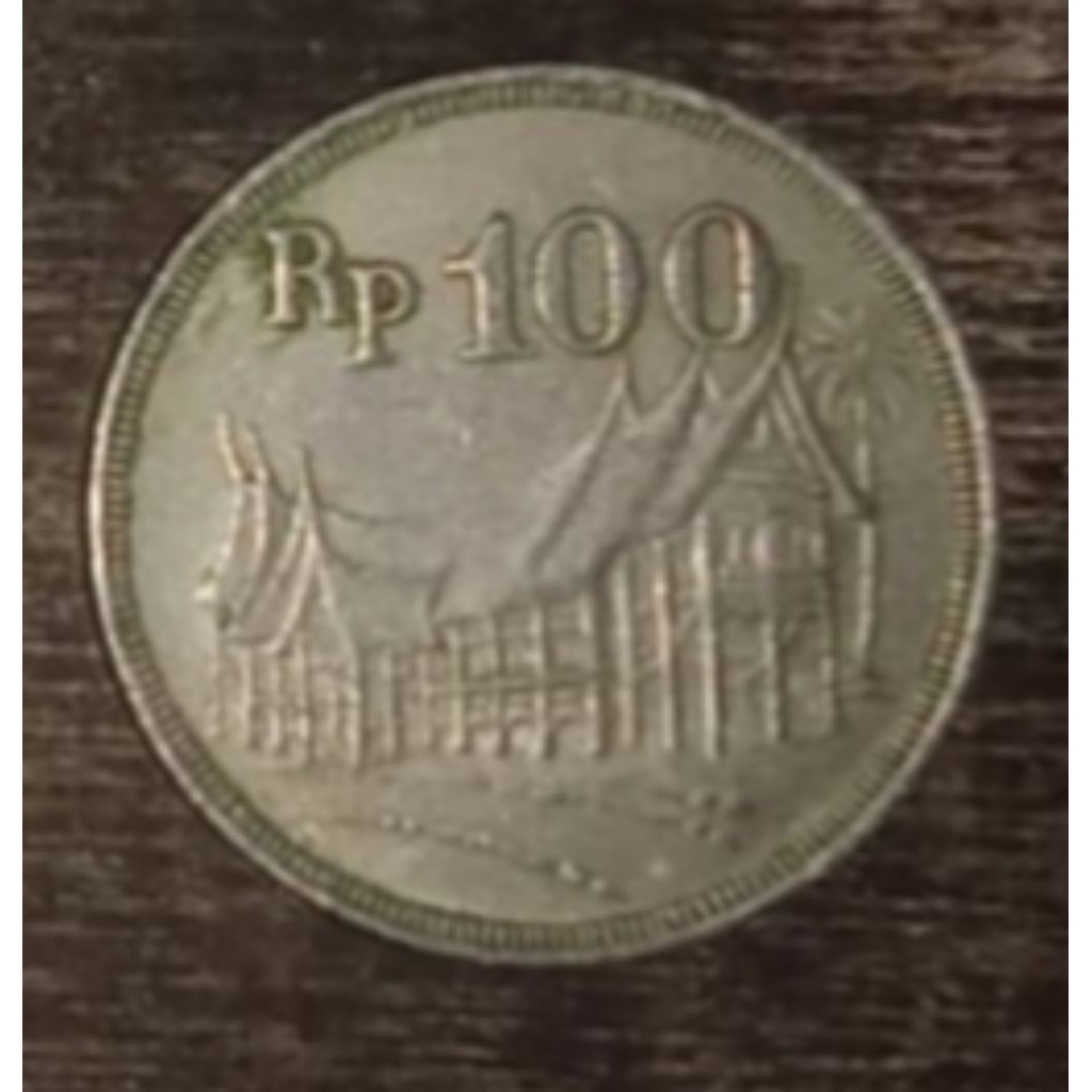 uang koin 100 rupiah rumah adat