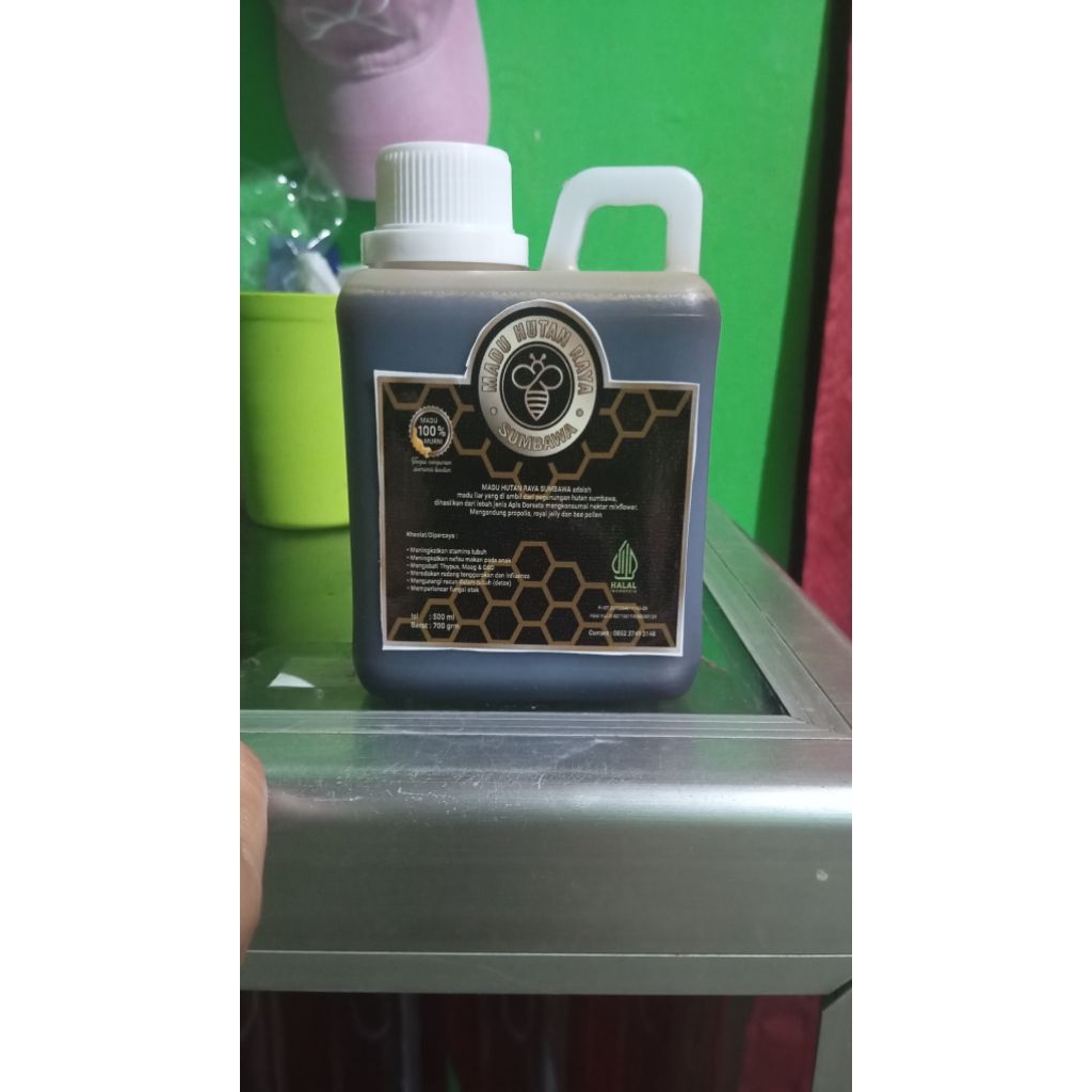 

Madu_hitam hutan asli 100%