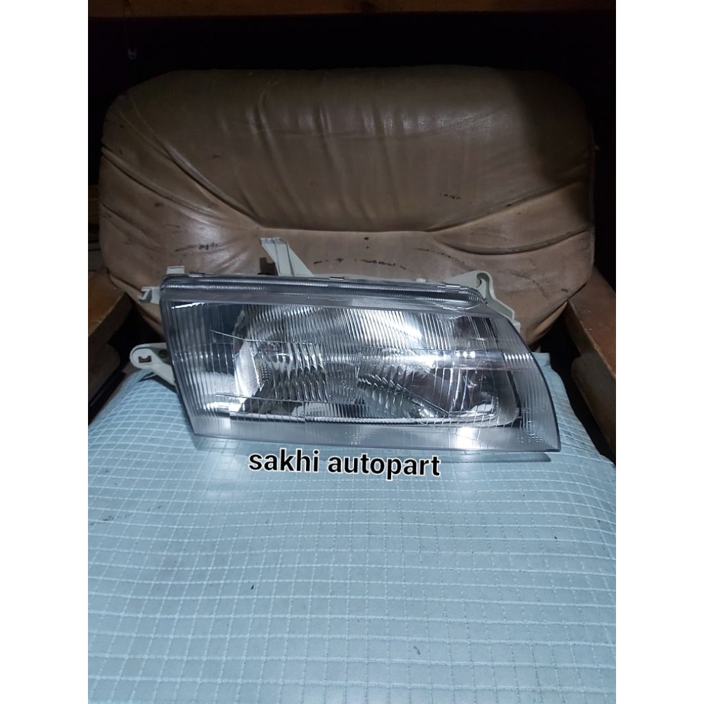 headlamp mazda 323 familia kanan merk tyc 1997-1999
